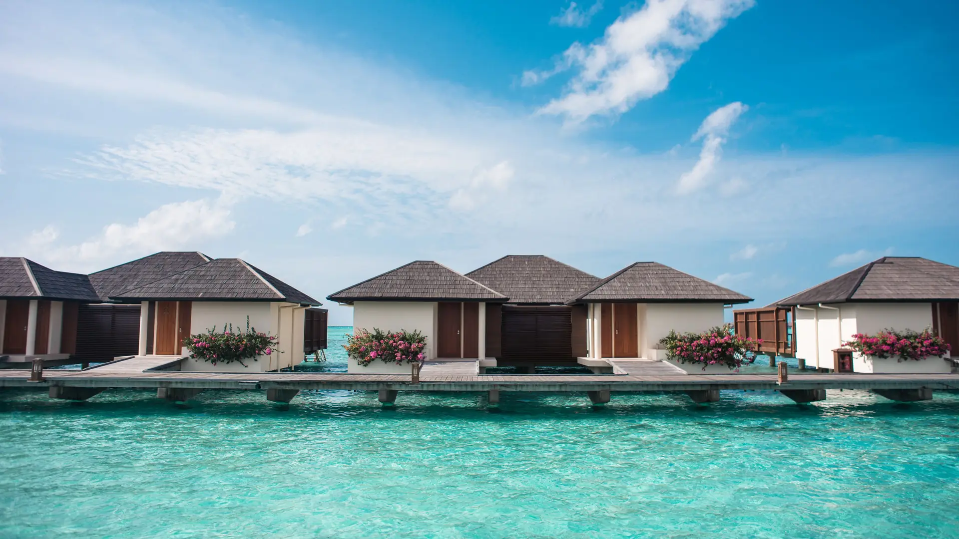 Water villas on stilts over the lagoon in the Maldives