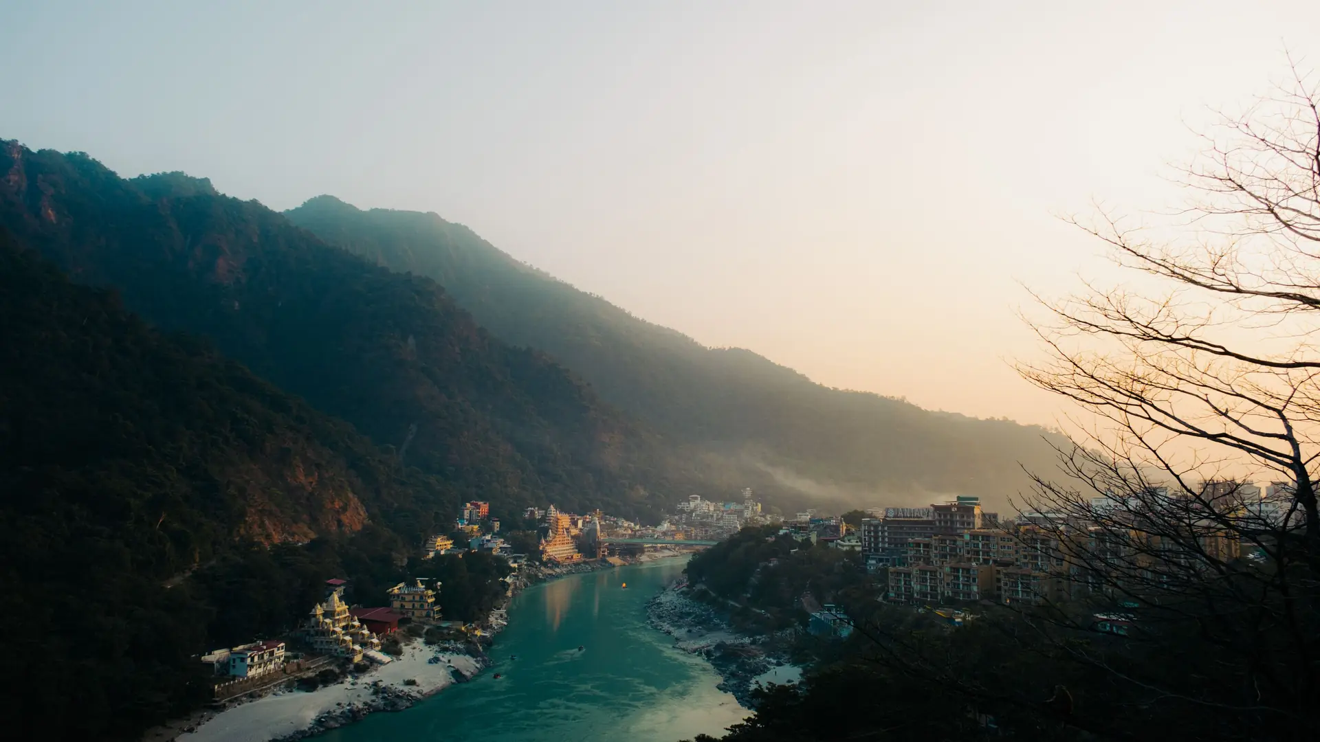 The Ganga valley at Rishikesh in evening light, hills on both sides
